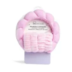 Ensemble IDC Institute comprenant un bandeau et des bracelets pour la routine skincare, coloris rose et lilas.