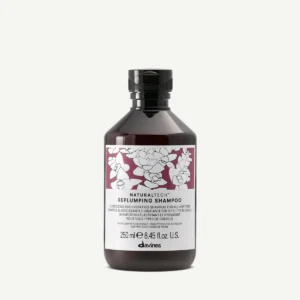Flacon de Davines Naturaltech Replumping Shampoo, shampooing repulpant et reconstituant pour cheveux plats, fins ou fatigués.