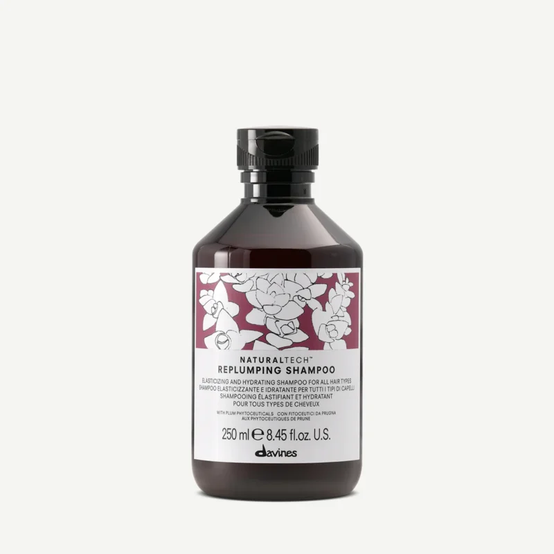 davines-naturaltech-replumping-shampoo Flacon de Davines Naturaltech Replumping Shampoo, shampooing repulpant et reconstituant pour cheveux plats, fins ou fatigués.