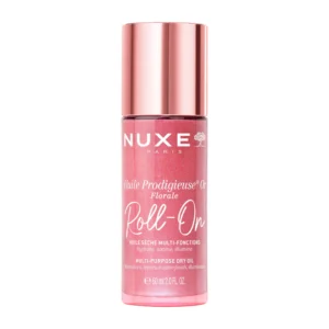 Flacon nomade en verre NUXE Huile Prodigieuse Or Florale Roll-On de 60ml avec applicateur à bille pour un éclat or rose irisé.