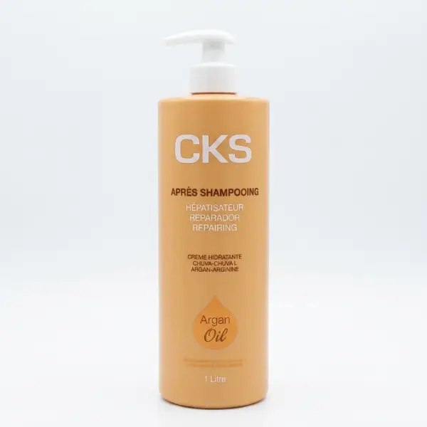 Flacon professionnel de 500 ml du CKS Après-Shampoing Réparateur pour le traitement des cheveux abîmés et cassants.